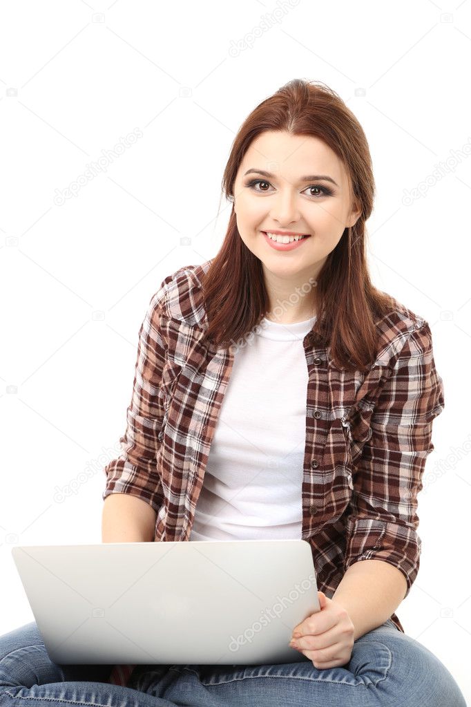Beautiful young woman with laptop isolated on white