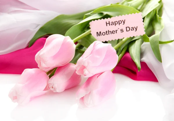 Beautiful bouquet of pink tulips on cloth for Mother's Day, isolated on white — Stock Photo, Image