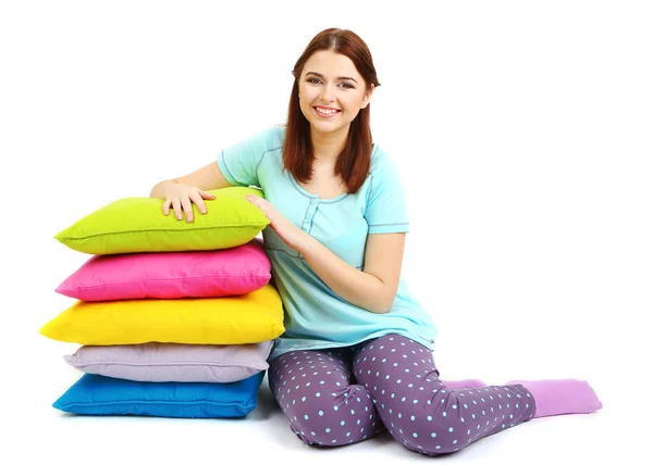 Bela menina com travesseiros isolados no branco — Fotografia de Stock