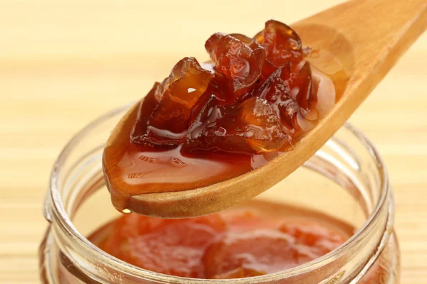 Tasty homemade jam, on bamboo mat — Stock Photo, Image