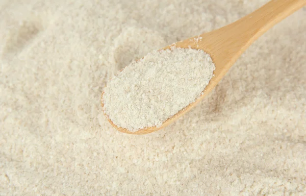 Powdered milk with spoon for baby close-up — Stock Photo, Image