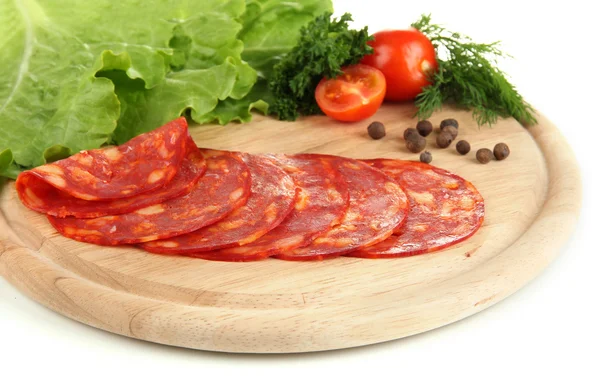 Salami slices on wooden board, isolated on white — Stock Photo, Image