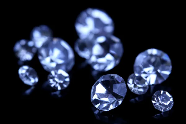 Beautiful shining crystals (diamonds), on black background — Stock Photo, Image