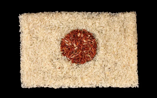 Arte bandiera giapponese creata con riso bianco e rosso isolato su nero — Foto Stock