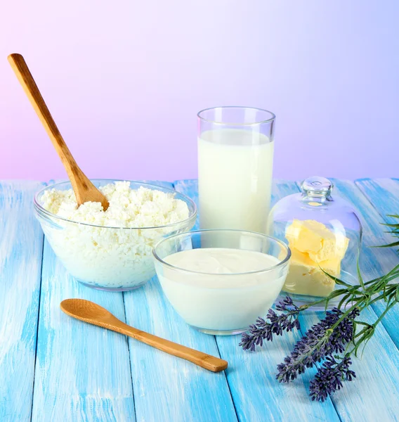 Glass of milk and cheese on light background — Stock Photo, Image