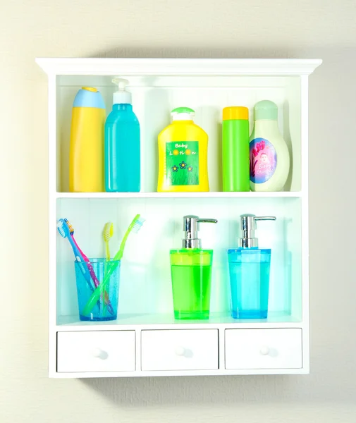 Beautiful white shelves with different bathroom objects — Stock Photo, Image