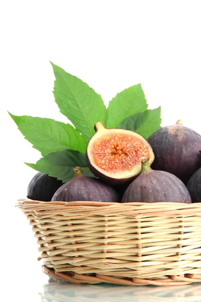 Ripe sweet figs with leaves in basket isolated on white — Stock Photo, Image