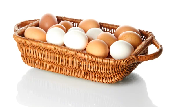 Many eggs in basket isolated on white — Stock Photo, Image