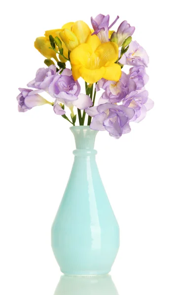 Beautiful bouquet of freesias in vase, isolated on white — Stock Photo, Image