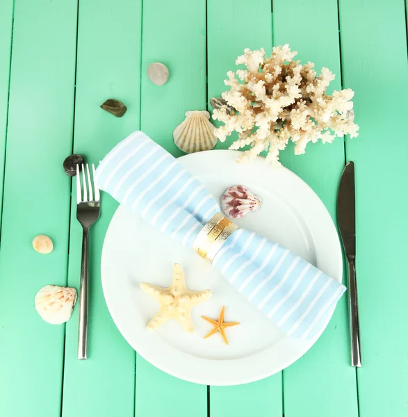 Marine table setting on color wooden background — Stock Photo, Image