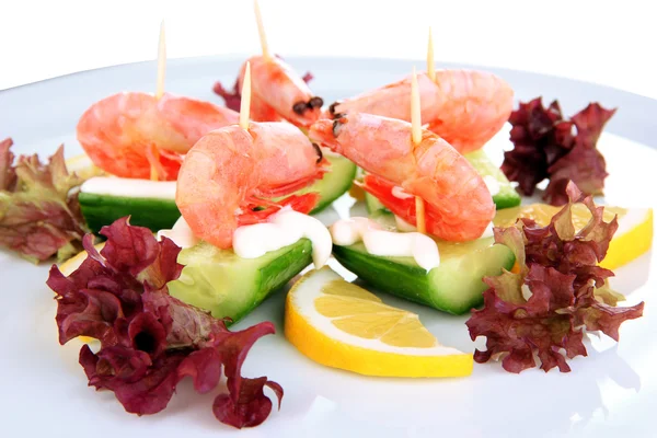 Small portion of food on big plate close up — Stock Photo, Image