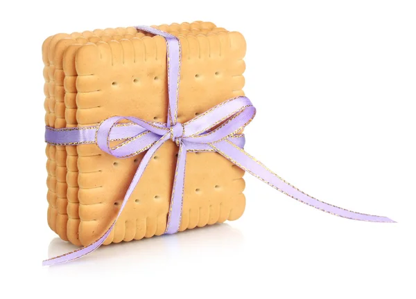 Dolci biscotti legati con nastro lilla isolato su bianco — Foto Stock
