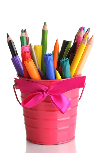 Colorful pencils and felt-tip pens in pink pail isolated on white — Stock Photo, Image