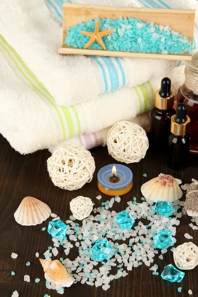 Sea spa elements on wooden table close up — Stock Photo, Image