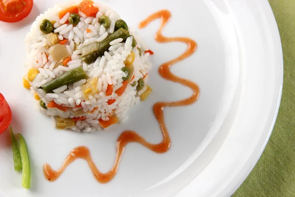 Delicious risotto with vegetables on table — Stock Photo, Image