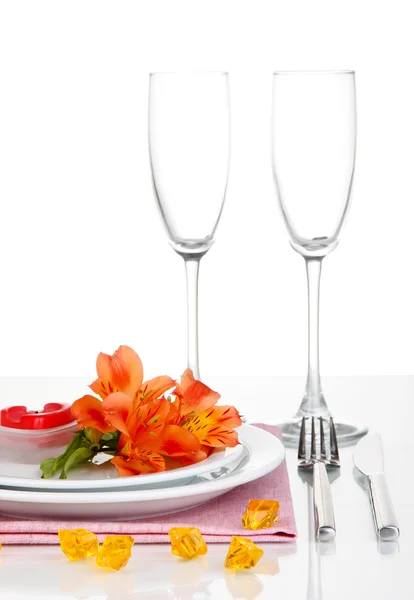 Festive table setting with flowers isolated on white — Stock Photo, Image