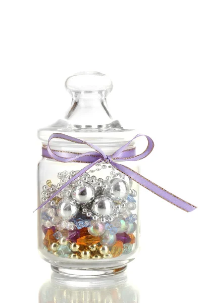 Glass jar containing various beads isolated on white — Stock Photo, Image