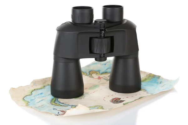 Black modern binoculars with map of adventure isolated on white — Stock Photo, Image