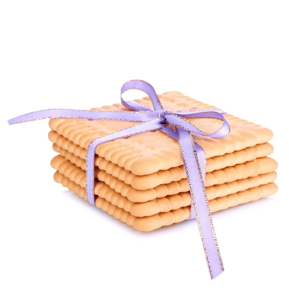 Sweet cookies tied with lilac ribbon isolated on white — Stock Photo, Image