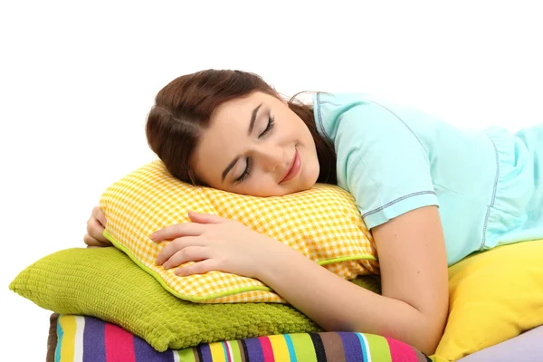 Hermosa joven con almohadas aisladas en whit — Foto de Stock