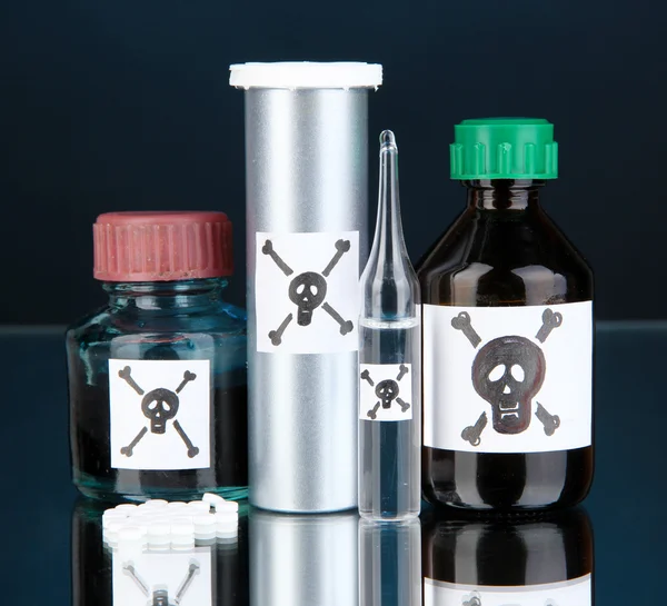 Deadly poison in bottles on black background — Stock Photo, Image