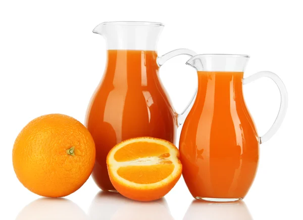 Orange juice in pitchers isolated on white — Stock Photo, Image