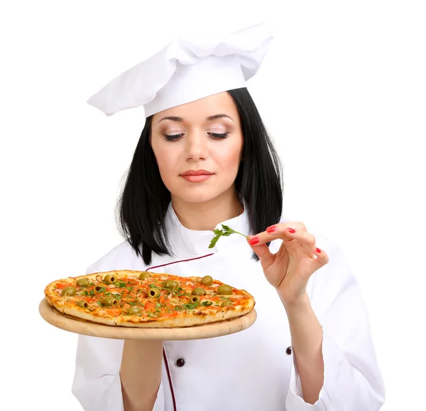 Hermosa chica jefe de cocina con pizza aislada en blanco — Foto de Stock