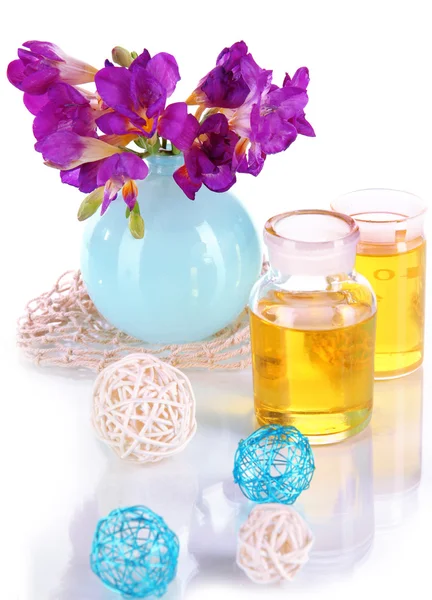Spa oil and freesia isolated on white — Stock Photo, Image