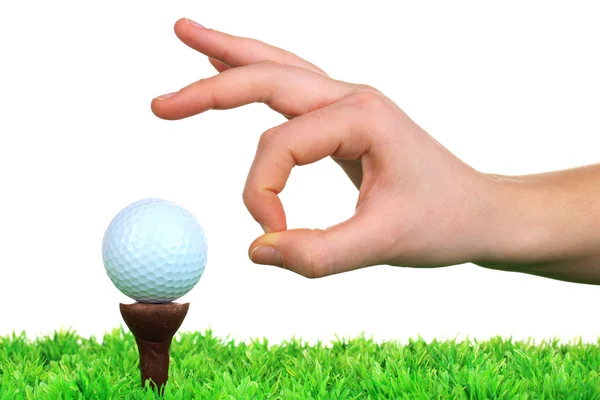 Pallina da golf e mano isolata su bianco — Foto Stock