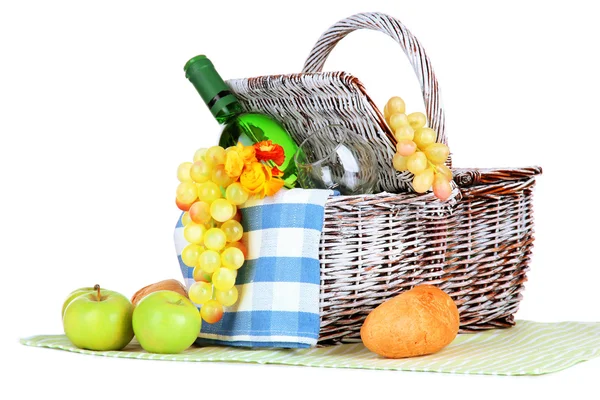 Picnic basket with fruits and bottle of wine, isolated on white — Stock Photo, Image