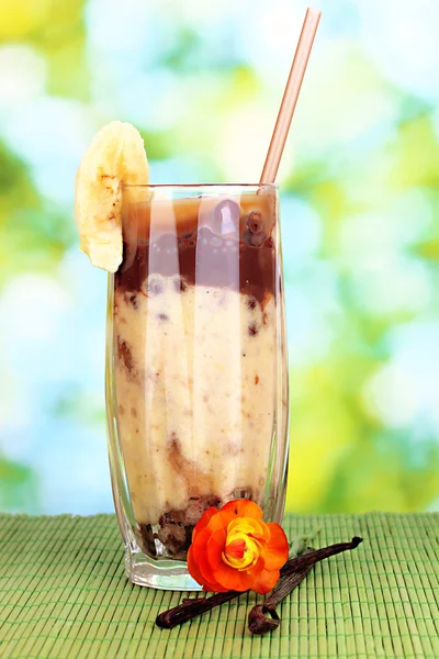 Delicious fruit smoothie on bright background — Stock Photo, Image