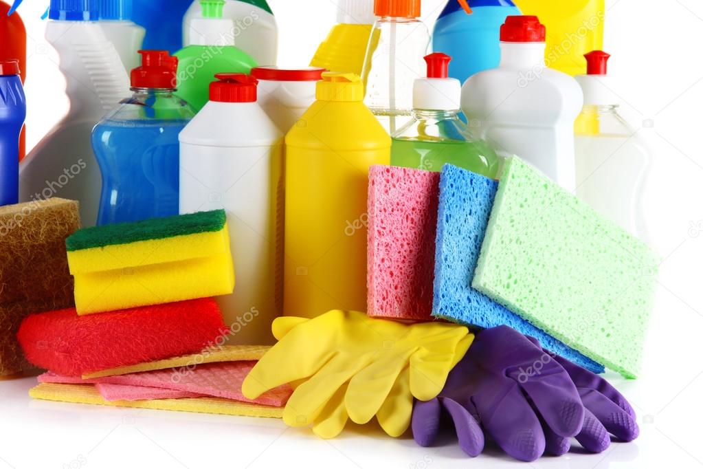 Different kinds of house cleaners and colorful sponges, gloves isolated on white