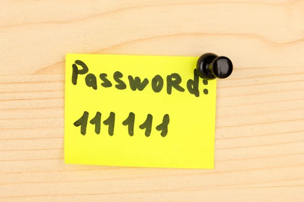 Sticker-reminder with most popular password, on wooden background — Stock Photo, Image