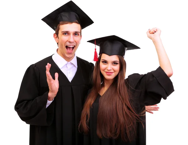 Twee gelukkige afstuderen studenten geïsoleerd op wit — Stockfoto