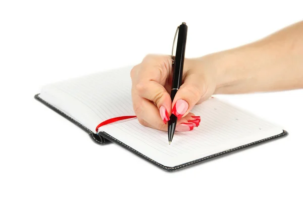 Hand signing in notebook, isolated on white — Stock Photo, Image