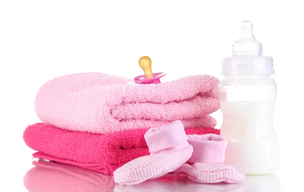 Bottle for milk with towels and nipple isolated on white — Stock Photo, Image