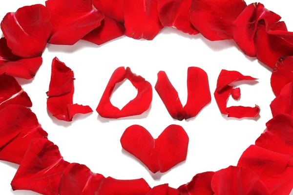 "Love" lined with red rose petals isolated on white — Stock Photo, Image