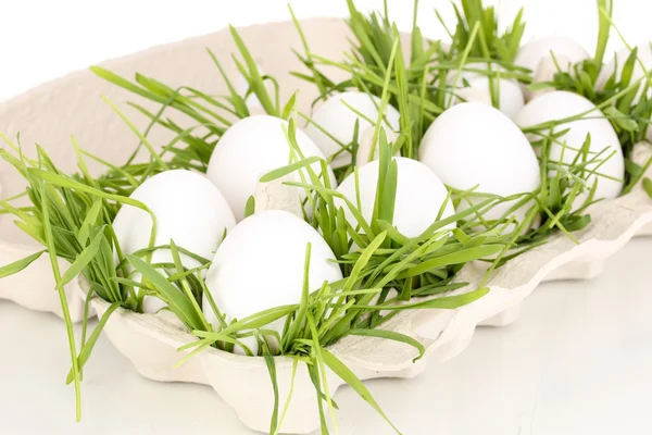 Eco-friendly eggs in box isolated on white — Stock Photo, Image