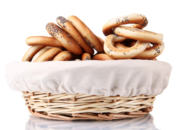 Tasty bagels in basket, isolated on white — Stock Photo, Image
