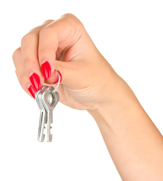 Hand med nycklar isolerade på vitt — Stockfoto