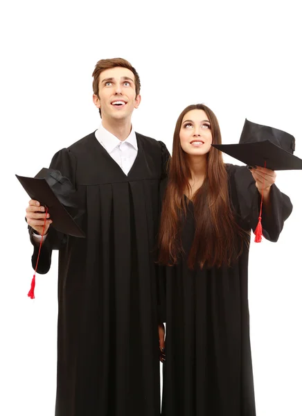 Twee gelukkige afstuderen studenten geïsoleerd op wit — Stockfoto