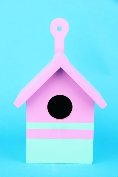 Decorative nesting box on color background — Stock Photo, Image