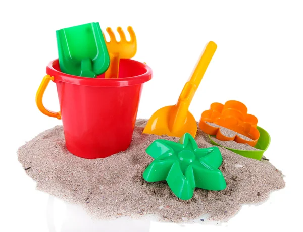 Jouets pour enfants sur sable isolé sur blanc — Photo