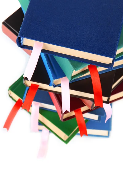 Veel boeken met bookmarks geïsoleerd op wit — Stockfoto