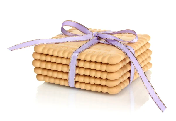 Dolci biscotti legati con nastro lilla isolato su bianco — Foto Stock