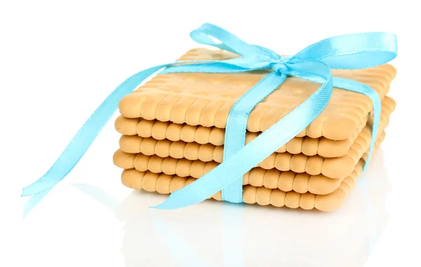 Sweet cookies tied with blue ribbon isolated on white — Stock Photo, Image