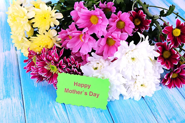 Bouquet of beautiful chrysanthemums on table close-up — Stock Photo, Image