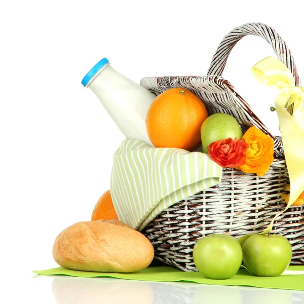 Picnic basket with fruits and bottle of milk, isolated on white — Stock Photo, Image