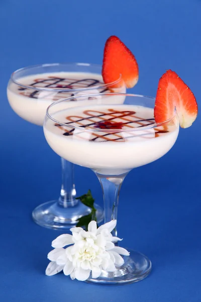 Fruit smoothies on blue background — Stock Photo, Image