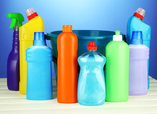 Cleaning items in bucket on color background — Stock Photo, Image